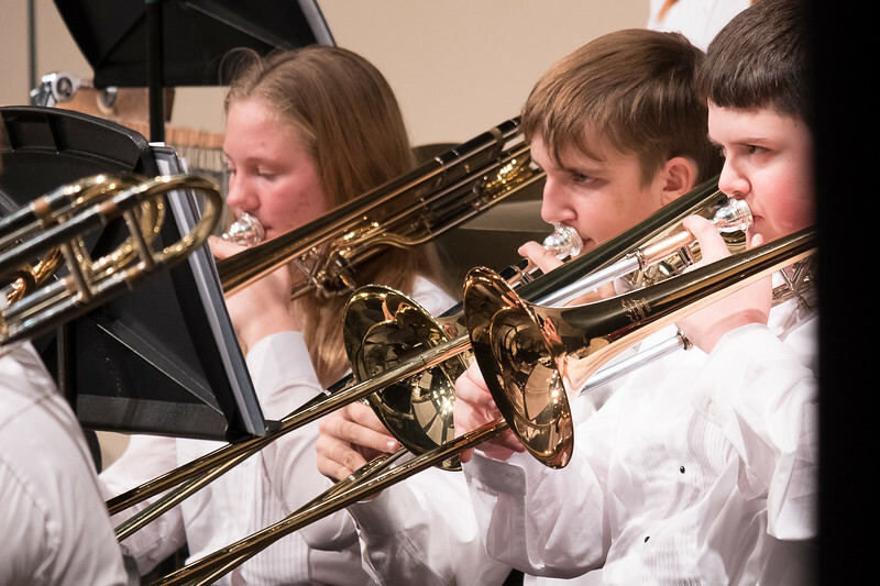 kids playing trumpets